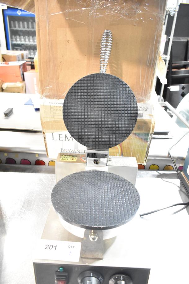 FLB613 commercial countertop waffle cone maker, 110 volts, 2 phase, clean condition, protective metal spring handle.