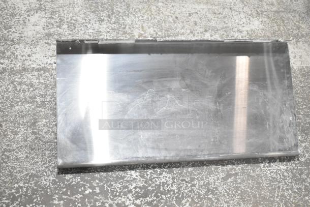 Stainless steel wall mount shelf, rectangular shape, visible surface scratches, good condition, ideal for kitchen use.