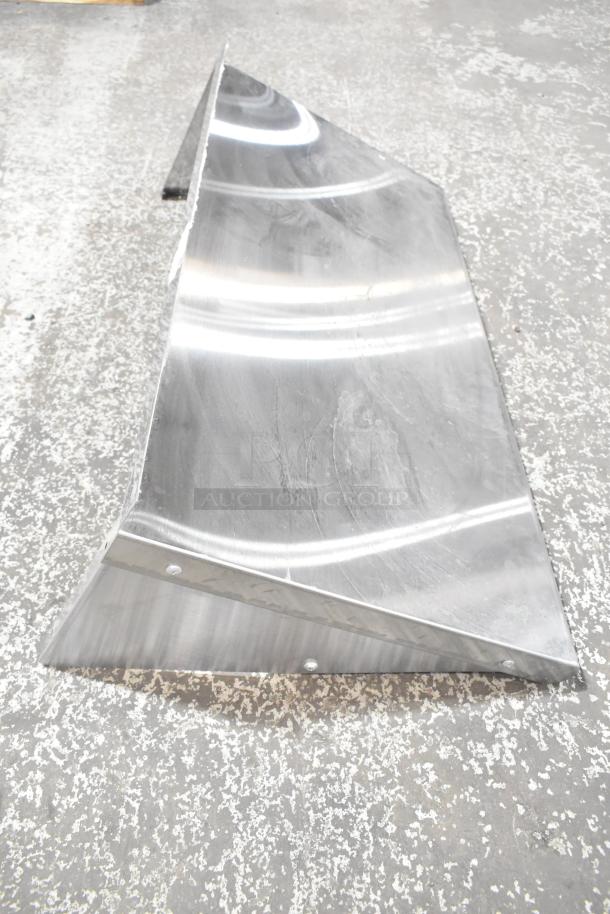 Stainless steel wall mount shelf with sleek finish and visible rivets, suitable for modern decor.