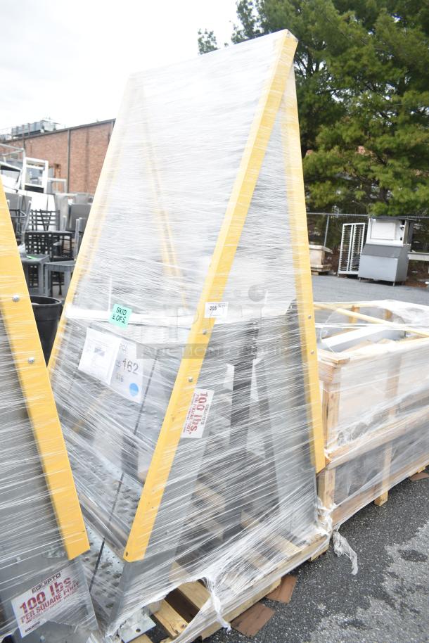 Brand new scratched and dented aluminum crossover steps with steel parts wrapped for protection, model MAR26-162.