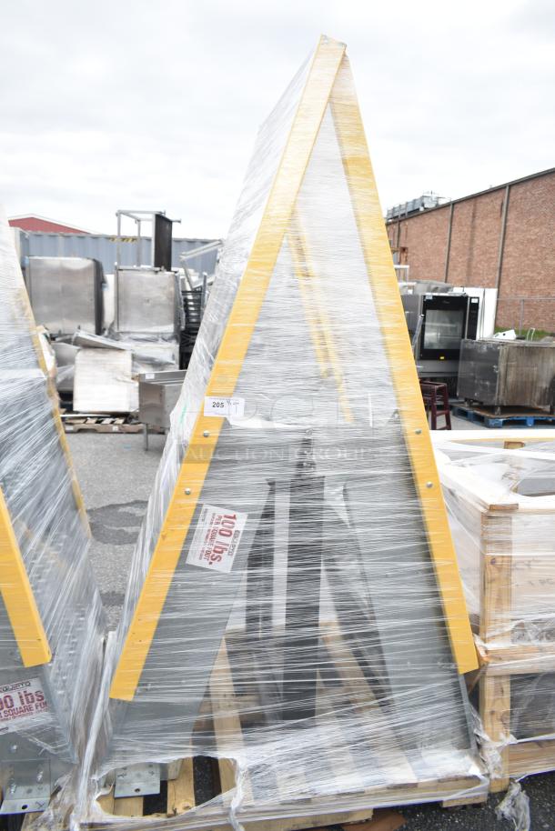 Brand new scratch and dent aluminum crossover steps with steel parts, model MAR26-162, wrapped in plastic.