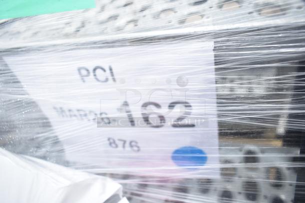 Brand new scratch and dent aluminum crossover steps with steel parts, model MAR26-162, labeled "PCI 162" in packaging.