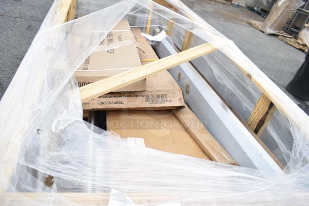 Three new scratch and dent items, including a wall shelf and sink, in packaging. Model 600TS2460S visible on box.