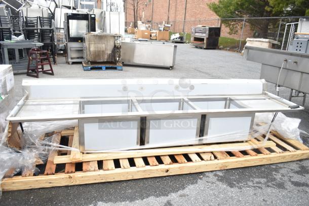 BRAND NEW Regency 600S32424224 Commercial 3 Bay Sink with dual drain boards, scratch and dent, on wooden pallet, wrapped.