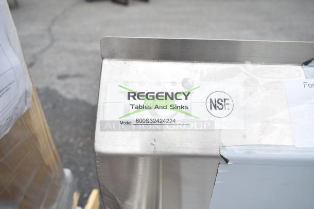 Brand new Regency 600S32424224 commercial sink with 3 bays, dual drain boards, NSF certified; minor scratches.