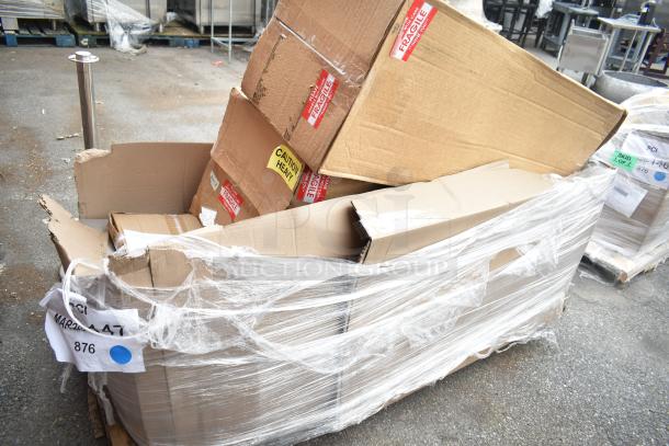Cardboard boxes labeled "Fragile" and "Caution Heavy," containing 3 new scratch-and-dent bar stools, wrapped for auction.