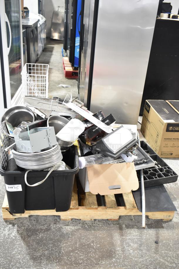 Pallet lot with metal pans, cylindrical bins, white baskets, and assorted items in various conditions.