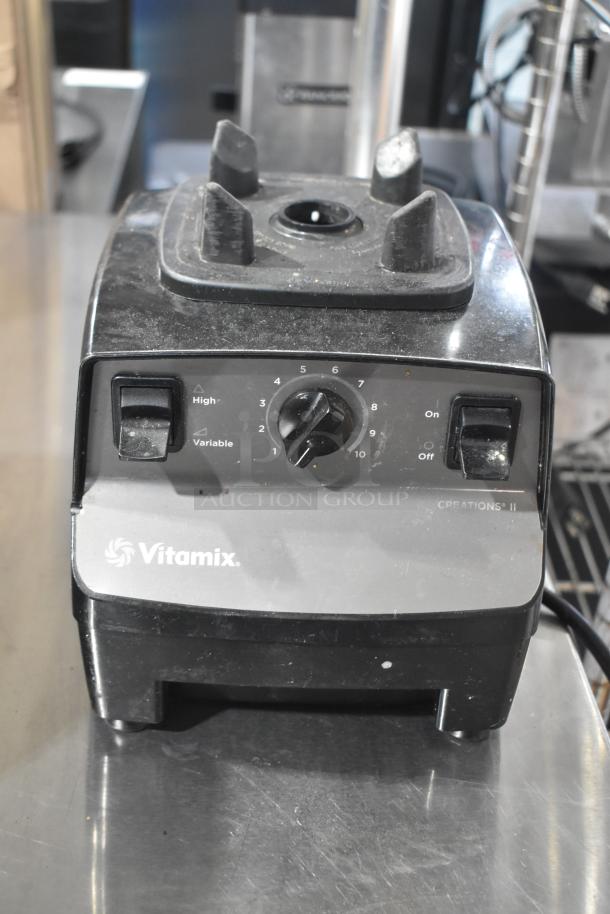 Two Vita-Mix VM0102/VM0103 blenders without lids, 120 volts, tested, do not power on, visible Vitamix logo.