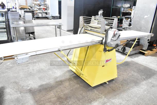 Rondo Seewer SSOR3 C reversible dough sheeter, floor style, 208/250 volts, 1 phase, commercial use, yellow base, good condition.