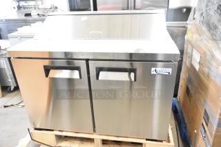 Brand new Avantco 178SSPT488 commercial sandwich salad prep table, scratch and dent condition, 115V, 1 Phase, visible logo.