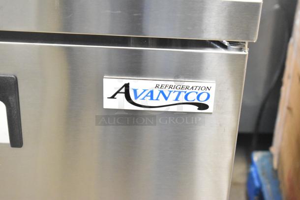 Brand new Avantco 178SSPT488 sandwich salad prep table with minor scratches; 115 volts, 1 phase.