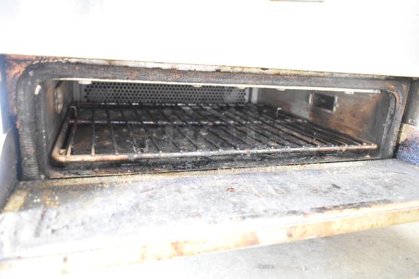 2023 Turbochef HHD Double Batch Electric Oven, impingement ventless, 208/240V, 3 phase. Interior shows wear.