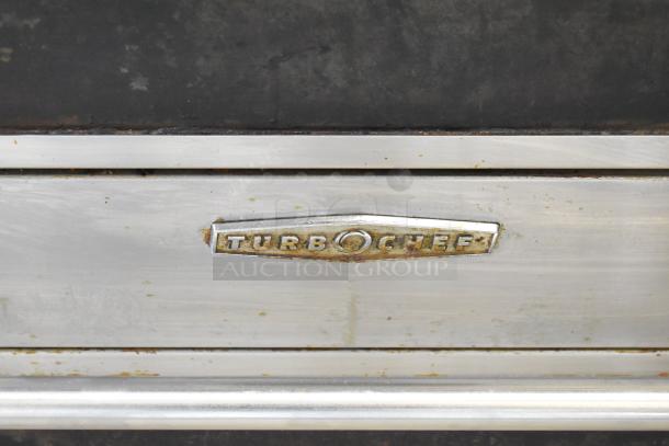 2023 Turbochef HHD Commercial Double Batch Oven, 208/240V, 3 Phase. Visible wear on stainless steel surface and Turbochef logo.