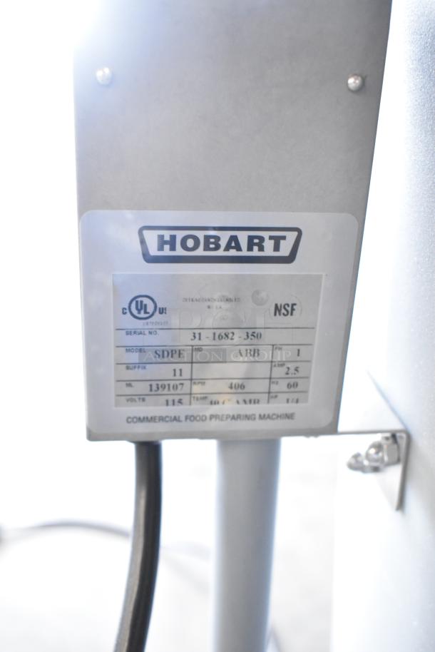 Label on Hobart SDPE-11 salad dryer indicates model, serial number, and electrical specs. Certified by UL and NSF.