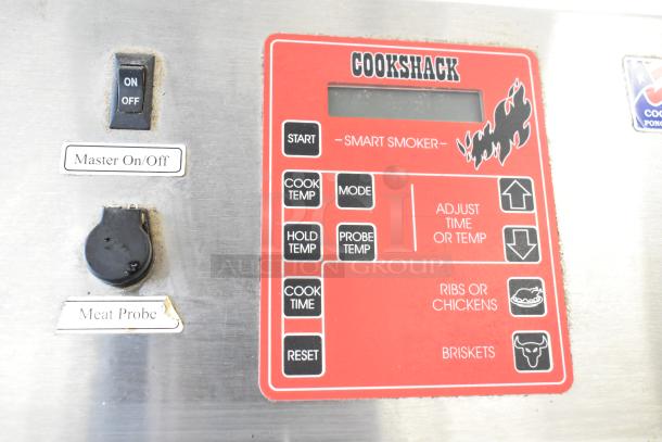 Cookshack 250 commercial smoker control panel with labeled buttons for temperature, mode, and time adjustments.