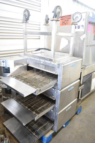 Turbochef HhC2020 commercial electric conveyor ovens with stand, 208/240V, 3-phase, 2017 model, used condition.