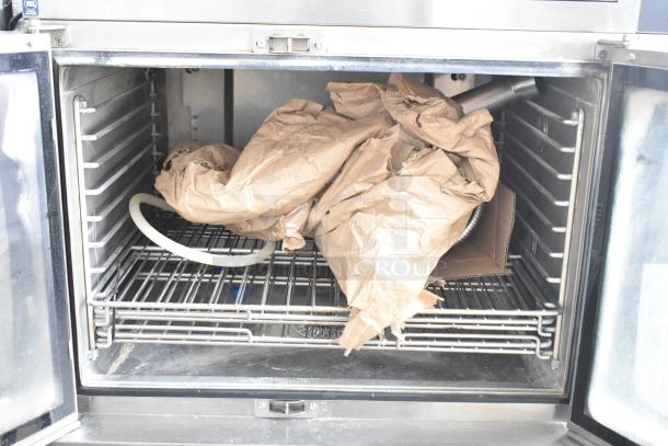 Blodgett HVH-100E convection oven interior, new condition, includes packaging. 208V, 3 Phase, stainless steel racks.