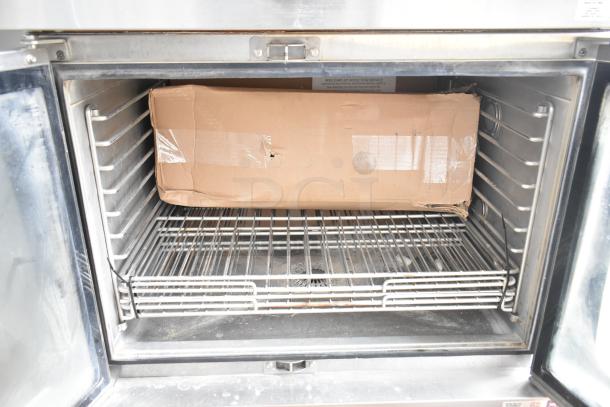 Blodgett HVH-100E HydroVection oven in new scratch and dent condition; convection oven with hood, 208V, 3-phase.