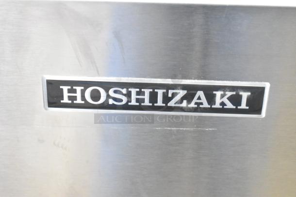 Hoshizaki F-1501MAJ ice machine logo on stainless steel surface; commercial unit, 1327 lb capacity, 208-230V, 1 phase.