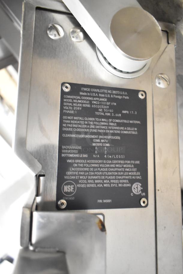 Vulcan VMCS-101BFIFM Commercial Double Clamshell Hood for Vulcan/Wolf Griddles, 208V, 1 Phase. Includes label details.