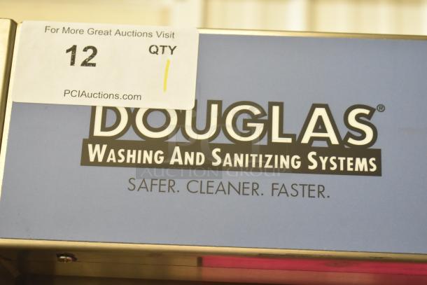 Douglas SD-20-ELEL stainless steel commercial pot/pan washer. 480V, 3 phase. Logo and PCI Auctions tag visible.