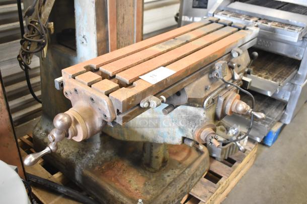 Bridgeport metal milling machine with Turnvision monitor. Floor-style, visible wear. Operates on 208/220/440 volts.