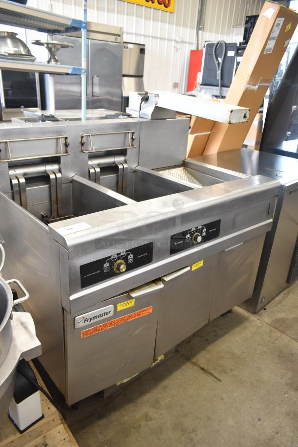 Frymaster FMRE217SC 2-bay electric fryer with dumping station and filtration, on commercial casters. Good condition.