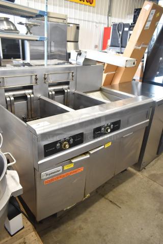 Frymaster FMRE217SC Commercial Floor Style Electric Powered 2 Bay Deep Fat Fryer w/ Dumping Station and Filtration on Commercial Casters.