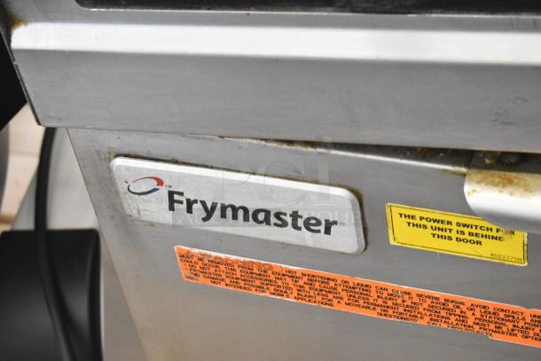 Frymaster FMRE217SC commercial 2-bay electric fryer with dumping station, visible brand label, filtration, on casters.