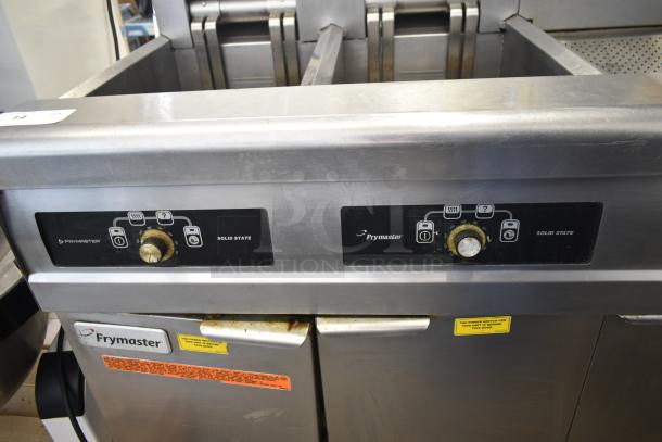 Frymaster FMRE217SC commercial 2-bay electric fryer with dumping station and filtration on casters, used condition.