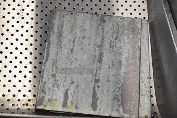 Frymaster FMRE217SC commercial fryer drip tray, stainless steel, with visible wear and scratches, used condition.