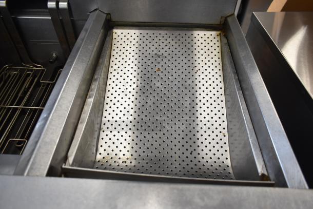 Frymaster FMRE217SC 2 Bay Deep Fat Fryer with dumping station, filtration, on casters. Stainless steel, commercial use.