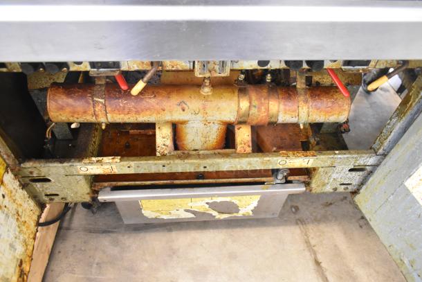 Frymaster FMRE217SC electric 2-bay fryer with visible wear, dumping station, filtration, and commercial casters.