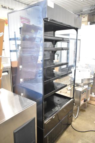 Hussmann MDN3575B1A 35" vertical open air cooler, black finish, 120 volts, 1 phase, multiple shelves, excellent condition.