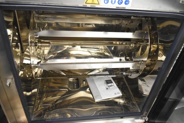 Brand new Alto Shaam AR-7T commercial rotisserie oven, 7 spit, 380-415V, 1 phase. Scratch and dent condition, 2022 model.