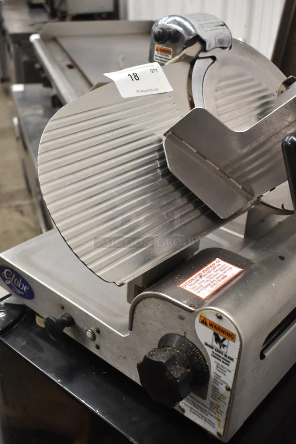 Globe 3600 Commercial Meat Slicer; stainless steel, 120V, 1 Phase. Features sharp blade and control knob, with safety warnings.