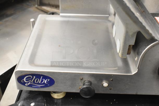 Globe 3600 Commercial Meat Slicer, countertop model, 120 volts, labeled "Globe Made in USA." Used condition.