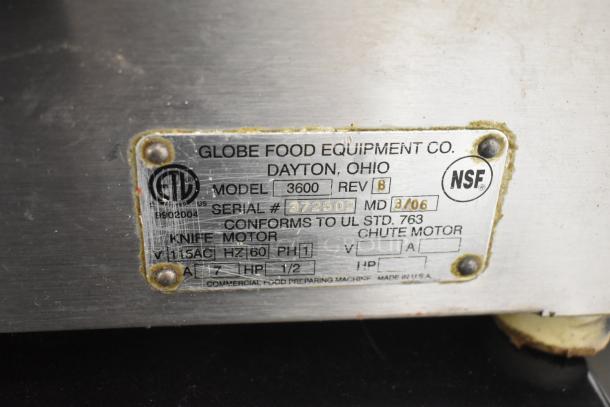 Globe 3600 Commercial Meat Slicer label showing model and serial number, 120V, 1 Phase, used condition.