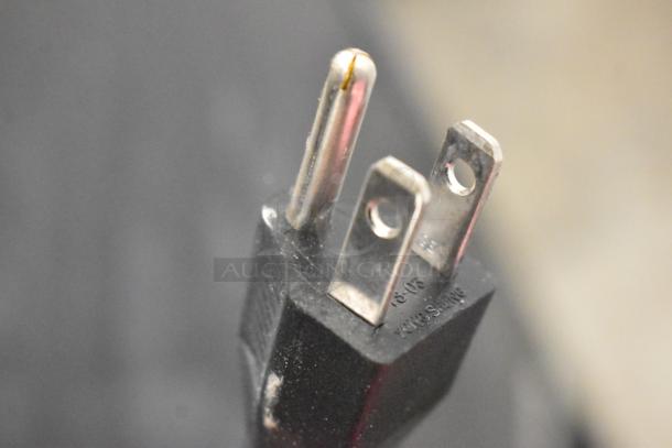 Close-up of a three-prong plug for a Vissani MCWC50DST Beverage Cooler, 115 Volts, 1 Phase. Plug in good condition.