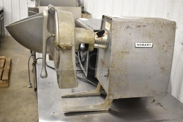 Hobart PD-70 commercial power drive unit with vegetable slicer attachment. No blade or frame. Visible wear, 115 volts, 1 phase.