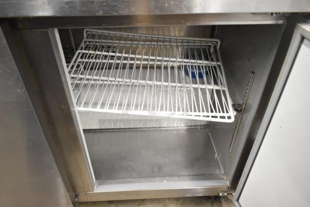 Cooler Depot UUC-72R-E-HC 3 Door Undercounter Cooler, commercial casters, metal interior, visible shelf, 115V, used condition.