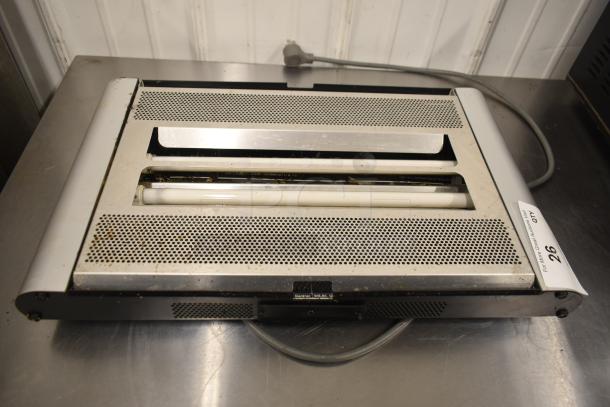 Bag Zapper unit, 115 volts, 1 phase; metal casing with mesh design. Visible label: "26." Used condition.