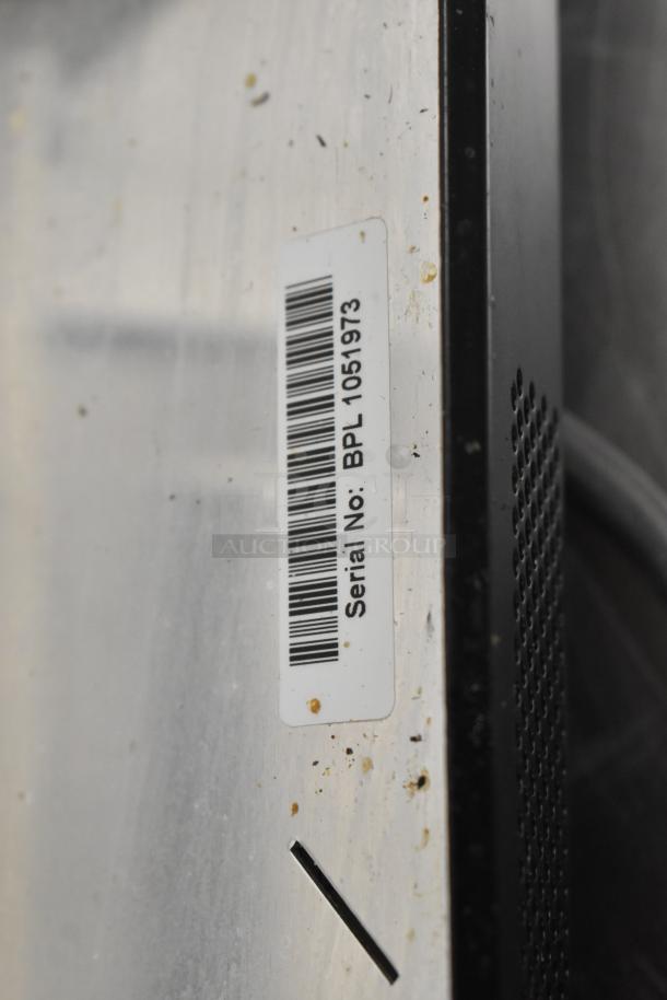 Bag Zapper, 115V, 1 Phase. Serial No: BPL 1051973 visible on label. Slight wear on surface.