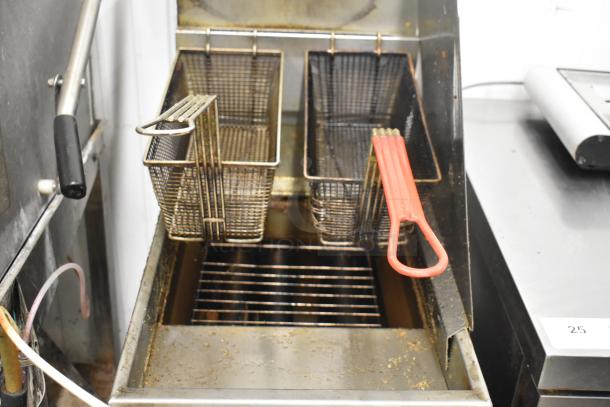 Pitco Frialator commercial deep fat fryer on casters with two metal fry baskets, in used condition.
