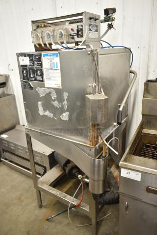 CMA EAH-2 pass-through dishwasher, 120V, 1 phase. Stainless steel, visible control panel, some wear on exterior.