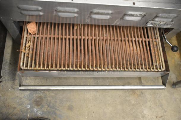 Imperial Commercial Gas Powered Cheese Melter, stainless steel, grill shows rust; used condition with visible residue and debris.