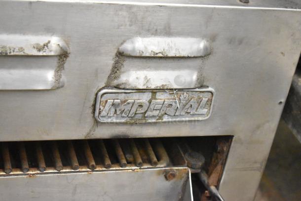 Imperial Commercial Gas Powered Cheese Melter, stainless steel, visible wear, Imperial logo displayed, suitable for kitchens.