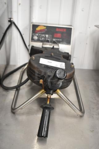Commercial countertop waffle maker, model RT-P. Features 120 volts, 1 phase power. Good condition with visible control panel.