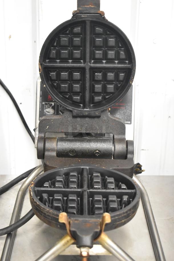 RT-P Commercial Countertop Waffle Maker, 120 Volts, 1 Phase. Used condition, visible wear. Open iron with waffle grid pattern.
