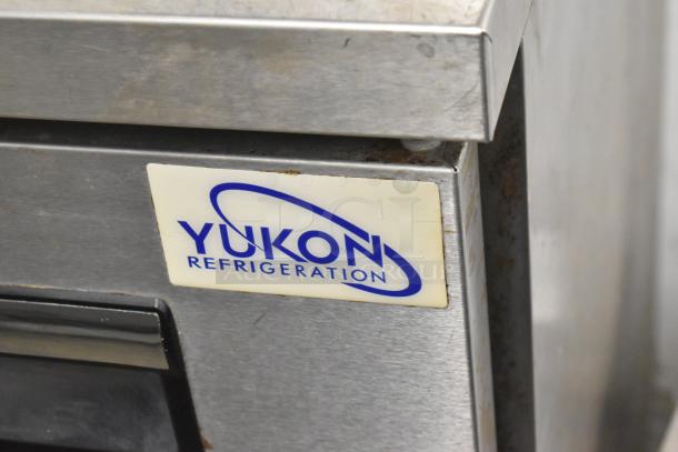 Yukon YUC-72F commercial freezer, 3 doors, undercounter, on casters. Stainless steel, 115V, 1 phase, visible logo.